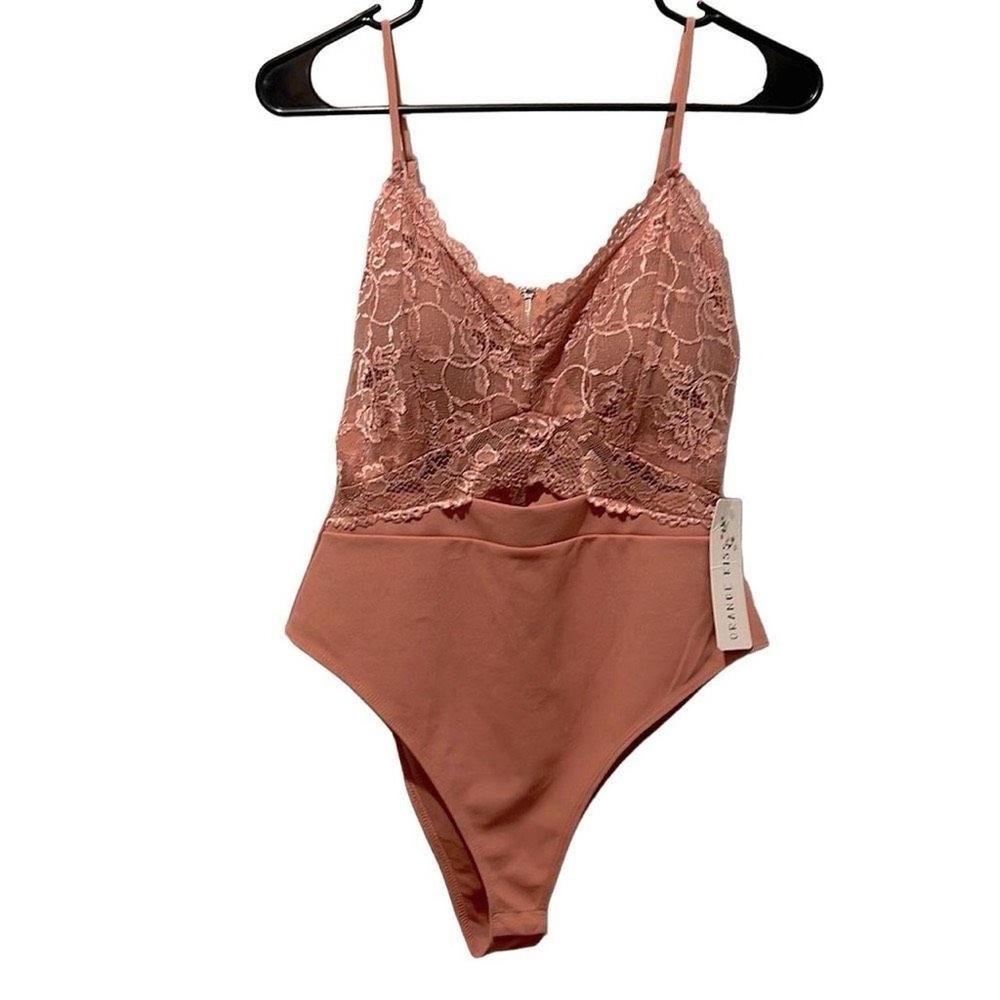 Super cute bodysuit never been worn